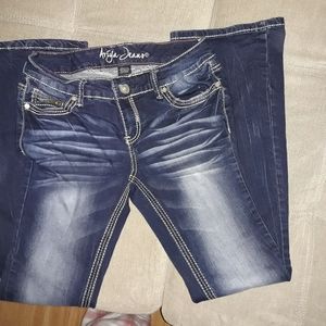 Distressed boot cut jeans